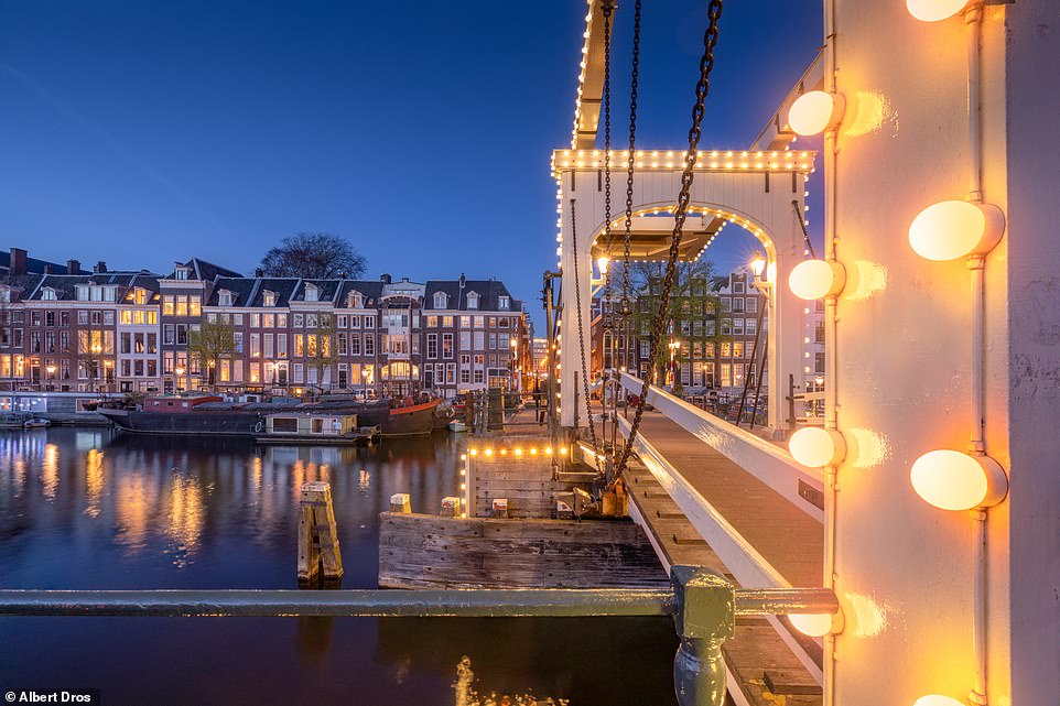 This still that Albert took while filming shows Skinny Bridge, at Kerkstraat. It was built in 1934 and lies about a three-minute walk from Hermitage Amsterdam