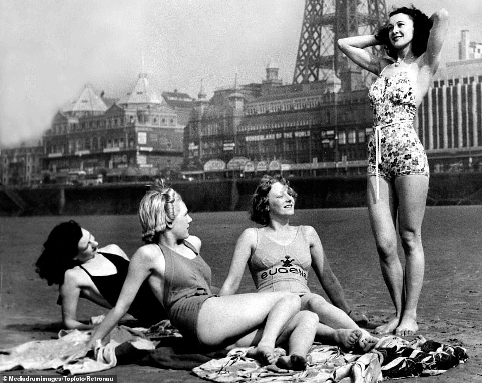 A group of tourists enjoy a seaside break in 1939 at Blackpool, the iconic British seaside resort and future home of a Butlin's hotel. Billy wanted to create a 'place of colour and happiness' where quality activities and entertainment would be provided