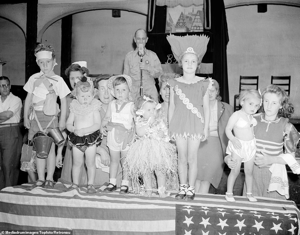 All sorts of fun and games at one of the Butlin's holiday camps with what appears to be a fancy dress contest. The Butlin family sold the business to the Rank Organisation as foreign holidays became increasingly affordable in the 70s